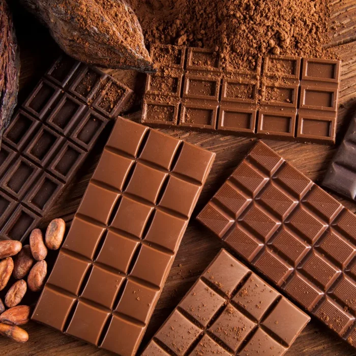 Chocolate sweet, cocoa pod and food dessert background